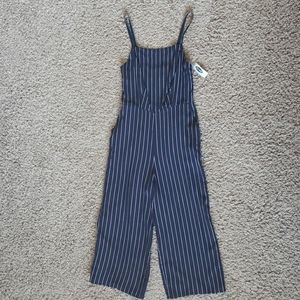A navy blue striped romper